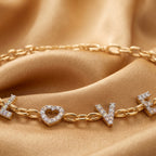 Gold Love Script Bracelet
